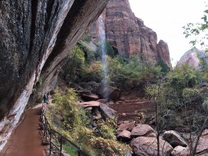 A waterfall continues to fill Lower Emerald Pool late in the year at Zion National Park. (Cheryl Welch | Travel Beat)