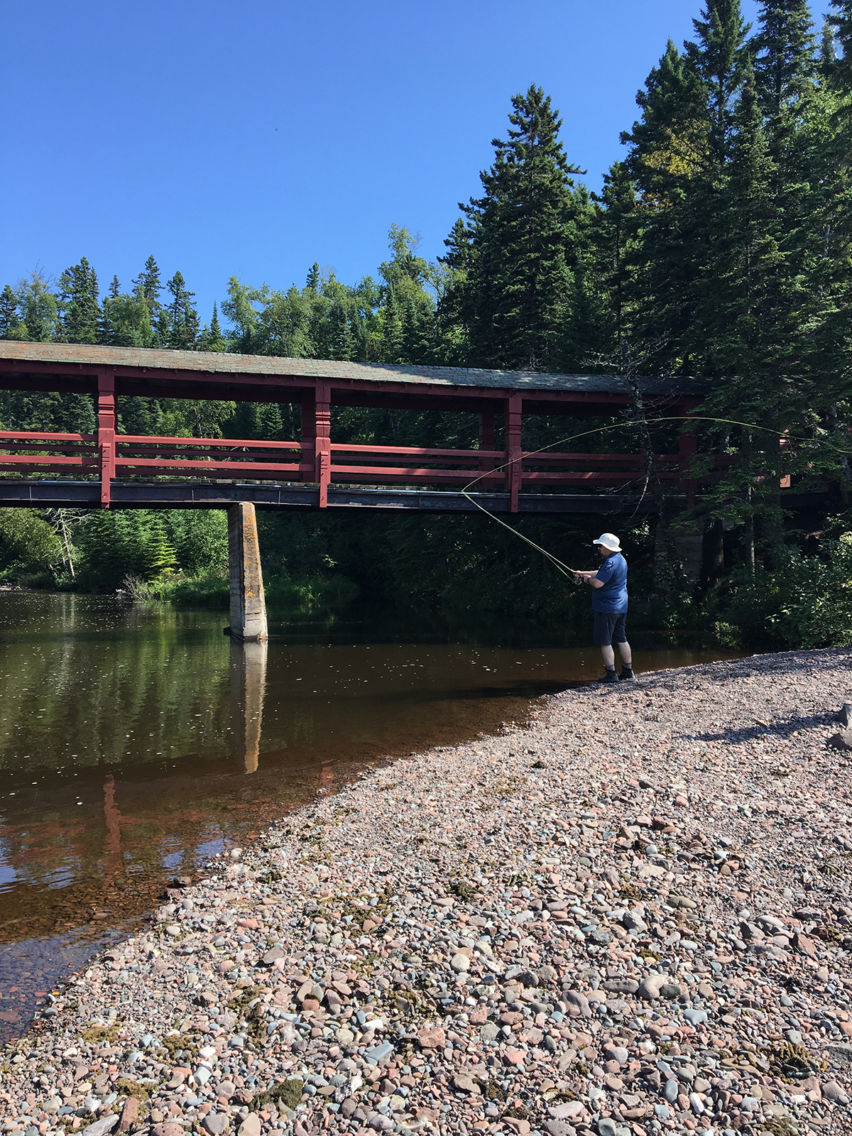 Try your hand at a variety of activities - such as fly fishing, paddle boarding, and sea kayaking at the historic Lutsen Resort. (Cheryl Welch | Travel Beat Magazine)